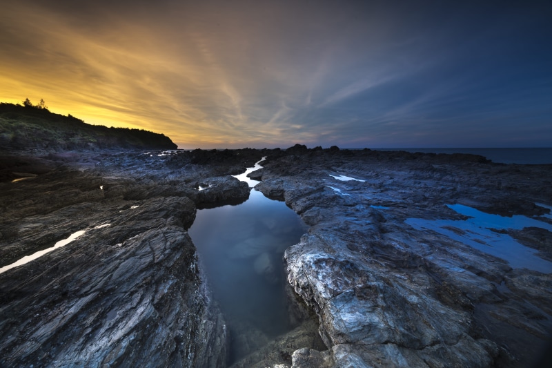 sunset, shore, tranquility, outdoors, no people, water, ocean, land, stones, peaceful, tranquil, seascape, rocky, dawn, seashore, scenics - nature, coast