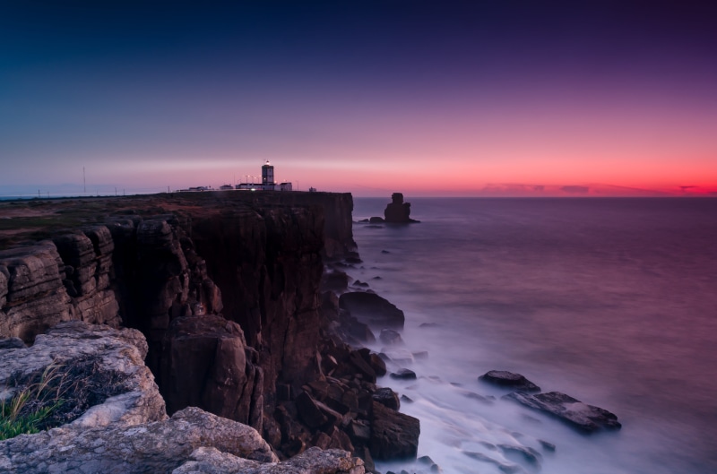 beauty in nature, scenery, nature, land, dawn, cliffside, rock - object, scenics - nature, tranquil scene, rock, light, landscape, horizon over water, shore