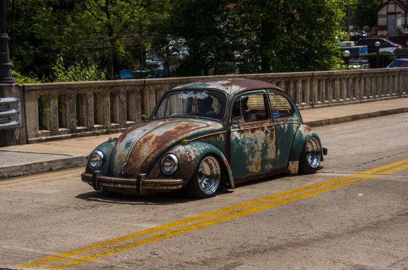outdoors, land vehicle, city, street, built structure, road, rust, day, architecture, nature, stationary, no people, 4K, transportation, car, retro styled