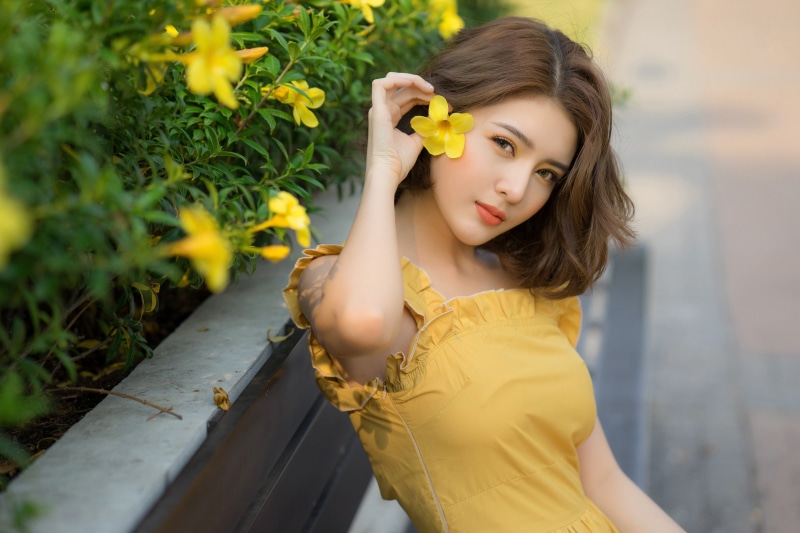 looking at camera, 5K, Asian, beauty, look, yellow dress, young adult, hairstyle, sleeveless, blurred background, girl, adult, s, face, yellow, women
