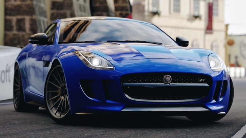 city, Jaguar (car), transportation, blue cars, vintage car, architecture, day, wealth, shiny, sports car, mode of transportation, outdoors, land vehicle