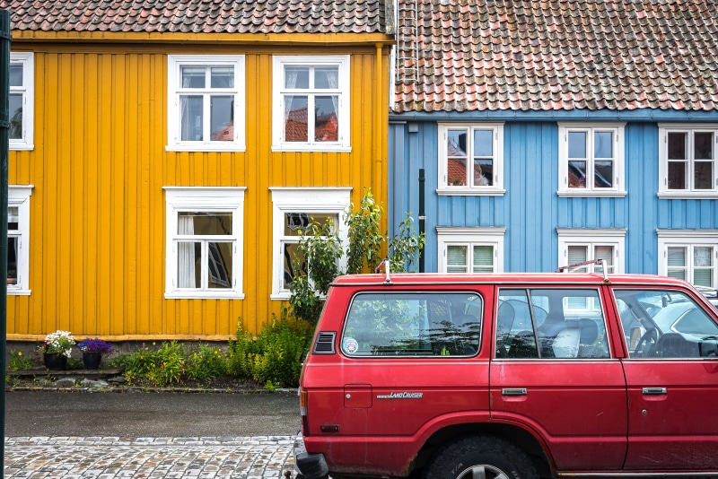 blue, city, mode of transportation, glass - material, color splash, residential district, village, day, yellow, colors, outdoors, window, norway, color