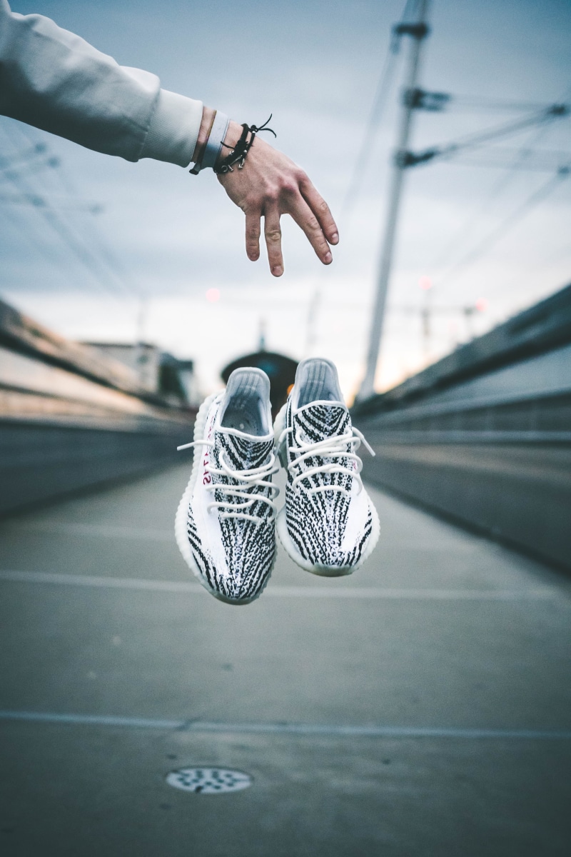 car, finger, v, close-up, 5K, adida, real people, yeezy, dropping, adidas, one person, low section, zebra, fabric sneaker, leisure activity, ub, adidas yeezy
