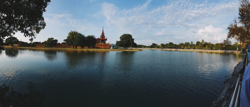 building exterior, water, beauty in nature, mandalay, 8K, architecture, tranquil scene, reflection, lake, plant, travel, scenics - nature, sky, cloud - sky