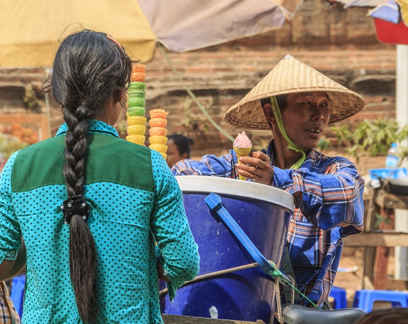 farmer, holding, lifestyles, market, mandalay, real people, occupation, hat, waist up, tourism, two people, nature, burma, myanmar, traditional, small business