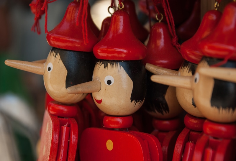 hanging, human representation, puppet, large group of objects, small, representation, day, conte, craft, group of objects, focus, doll, indoors, red, retail
