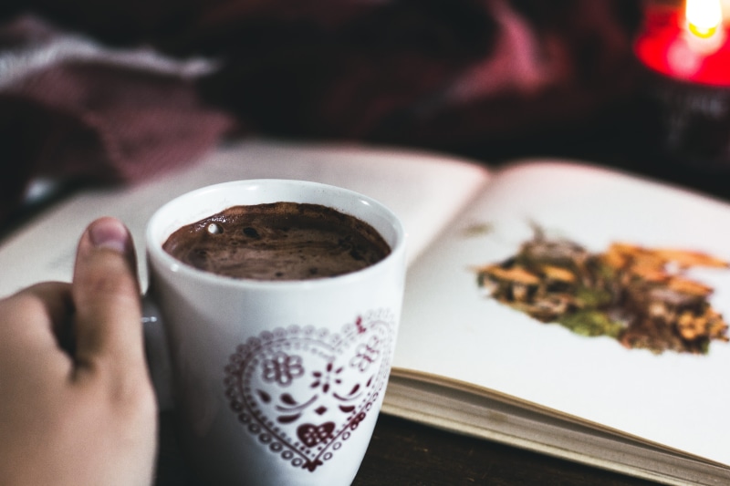 hot drink, autumn, personal perspective, close-up, cocoa, hand, seasons, chocolate, refreshment, candle, drink, indoors, mug, human body part, freshness