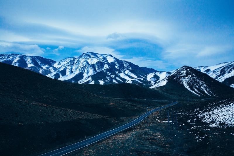 asphalt, tranquil scene, mountain range, iran, winter, peak, outdoors, mountain peak, non-urban scene, qom, dirt road, snowcapped mountain, gravel, ice