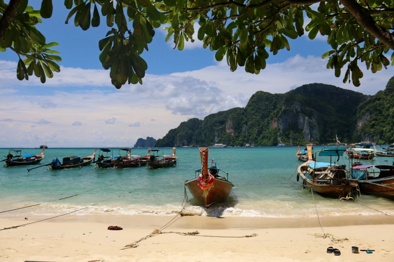 mode of transportation, moored, sea, phi phi islands, scenics - nature, nature, cloud - sky, no people, beach, sky, thailand, tree, mountain, water, longtail boat