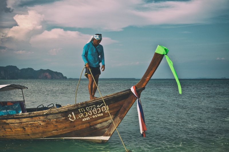 transportation, full length, mode of transportation, men, coastline, real people, cultures, district, 4K, nautical Vessel, cloud - sky, vacations, water