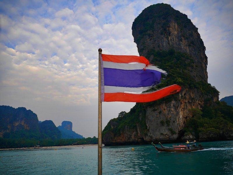 water, travel, scenics - nature, phukey, sea, patriotism, ocean, no people, flag, thailand, beach, andaman sea, railay beach, nature, day, mountain, cloud - sky