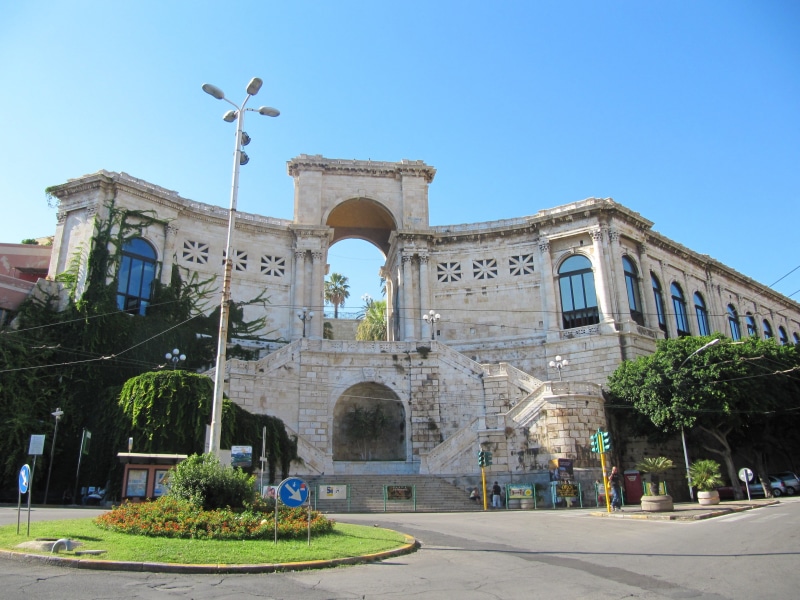 city, building, clear sky, bastion san remy, sky, 2K, building exterior, plant, the past, cagliari, built structure, sunlight, nature, low angle view