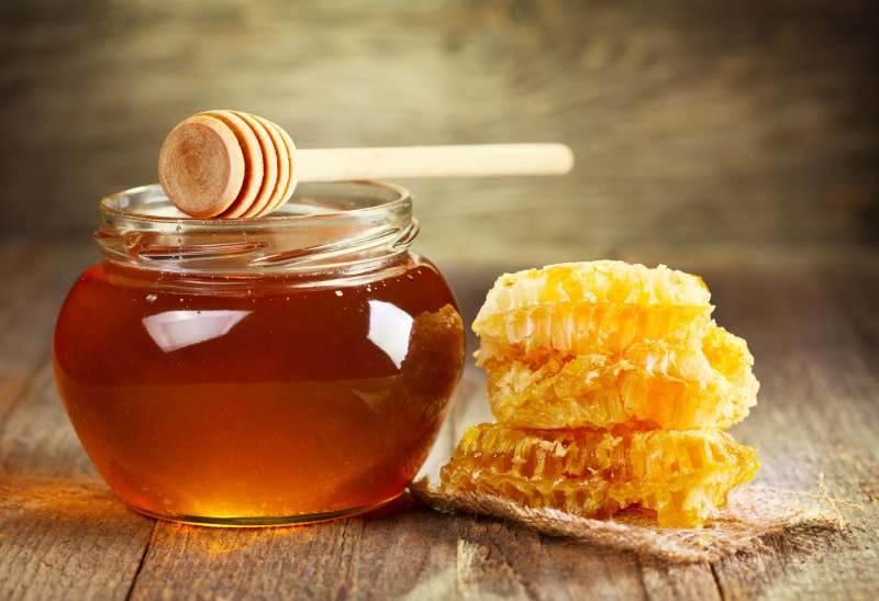 dessert, snack, spoon, glass, food and drink, sweet food, honey, indoors, close-up, jar, 8K, clear, cell, focus on foreground, glass - material, wood - material