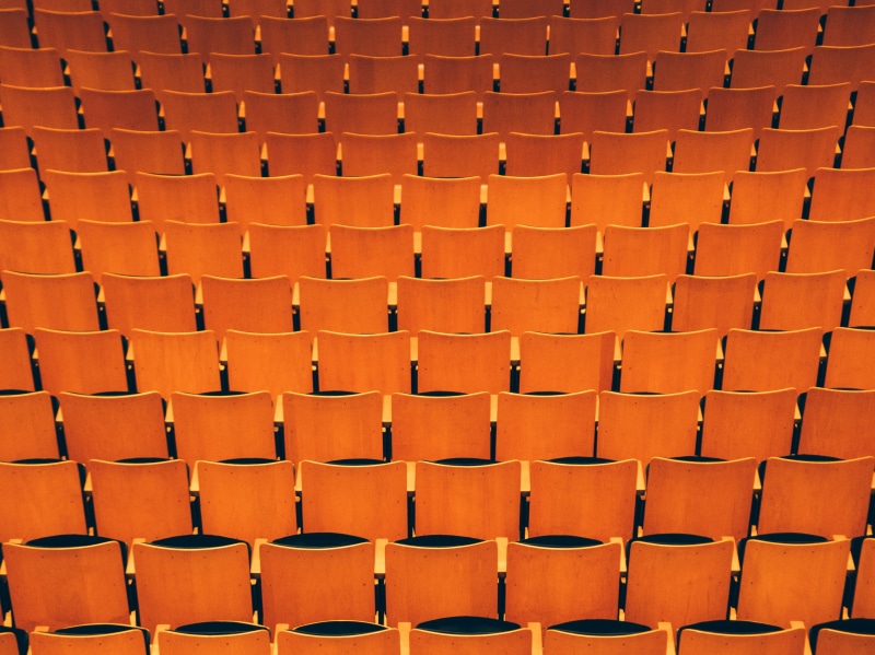 orange color, red, repetition, outdoors, no people, auditorium, arts culture and entertainment, chair, photo, repetitive, order, sport, in a row, absence