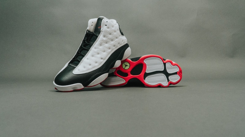 no people, white color, white, absence, sport, surface, sports shoe, flooring, studio shot, canvas shoe, shoes, air, compatibility, jordan, black, two objects