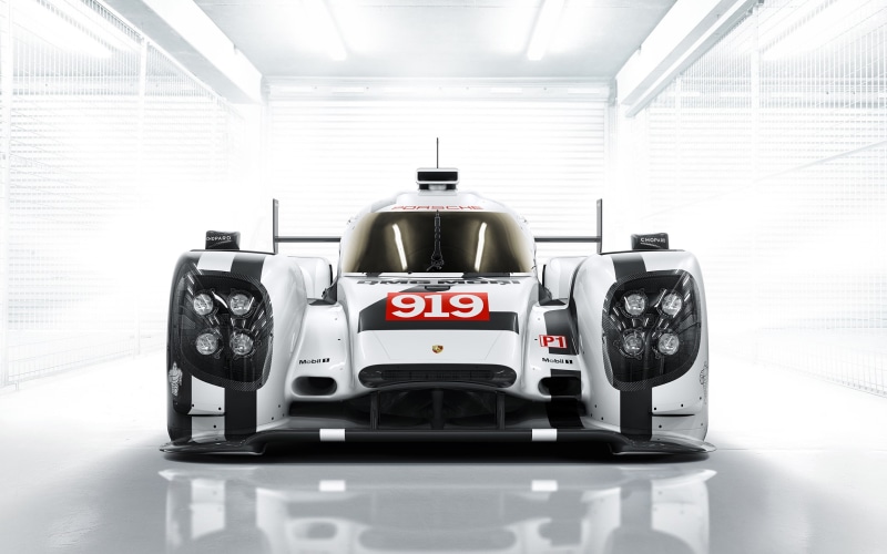 Porsche 919, illuminated, still life, mode of transportation, vehicle, no people, front view, communication, text, car, competition, single object, technology
