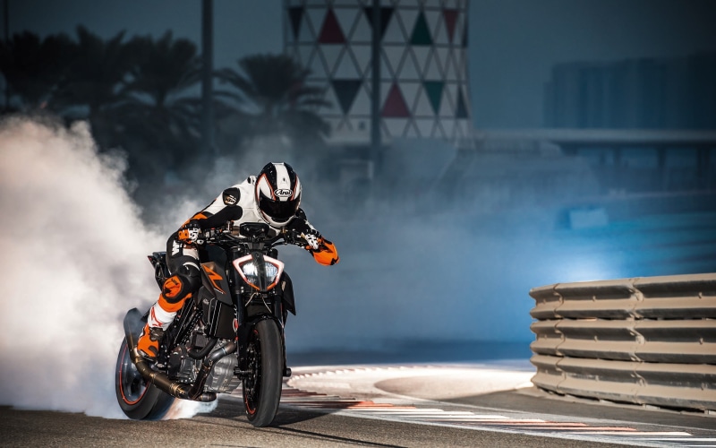 mode of transportation, sports helmet, crash helmet, driving, Duke, motorcycle racing, motorsport, sport, land vehicle, headwear, extreme sports, one person