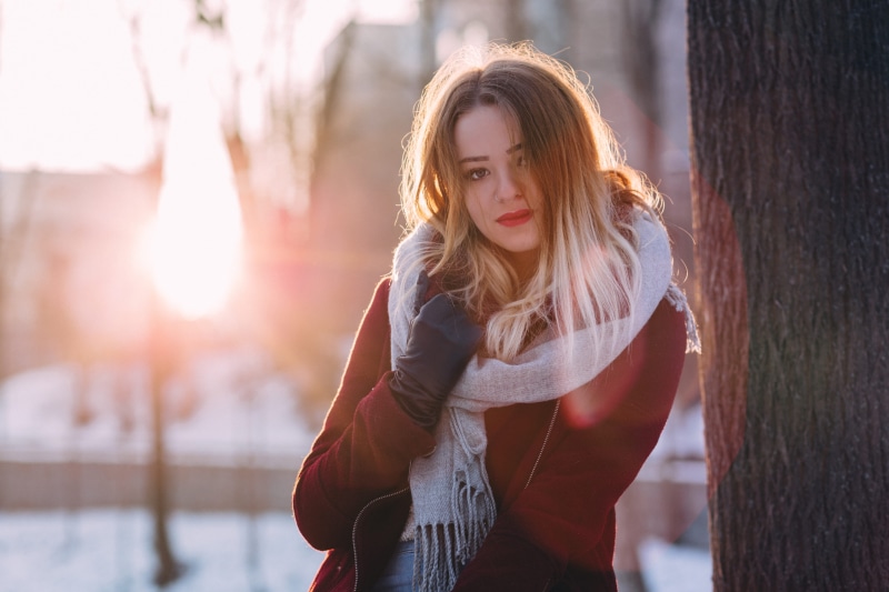5K, young, warm clothing, tree, one person, lifestyle, beautiful woman, standing, smile, cute, people, hair, clothing, model, young adult, long hair, blur