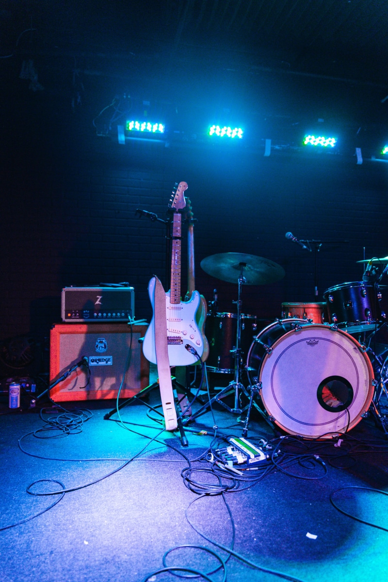 event, electric guitar, popular music concert, stage light, music festival, musical instruments, enjoyment, spotlights, microphone, performance, concert