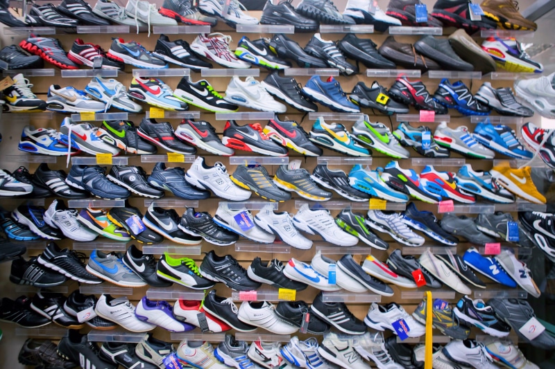 many, china, cloth, sneaker, sell, no people, side by side, shoes, shoe, footwear, background, large group of objects, multi colored, day, arrangement