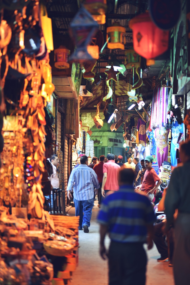 people, for sale, sale, Cairo, arabic, outdoors, souk, city, retail display, old, store, built structure, adult, Bazaar, egyptian, illuminated, culture