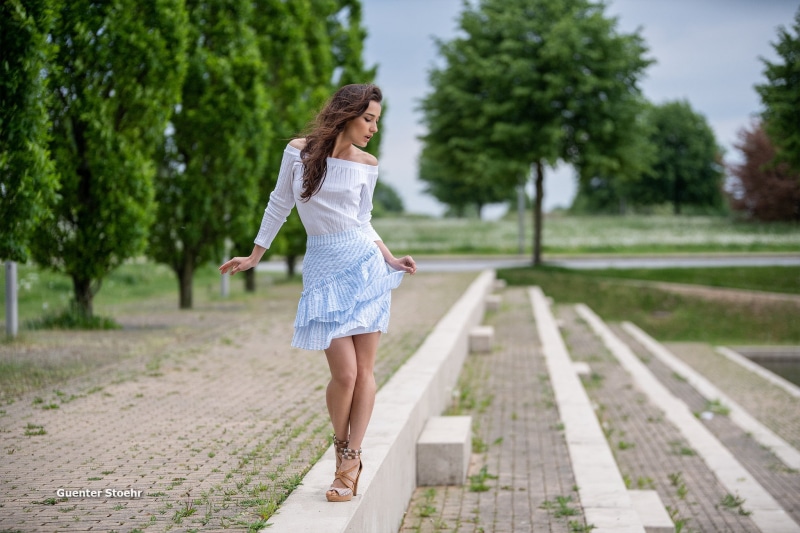 bare shoulders, adult, trees, clothing, young women, beautiful woman, motion, hairstyle, Guenter Stoehr, lifestyles, one person, high heels, women, skirt