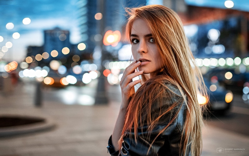 outdoors, lifestyles, black, looking at viewer, Vasilisa Sarovskaya, long hair, headshot, portrait, teal, one person, brown eyes, leather jackets, open mouth