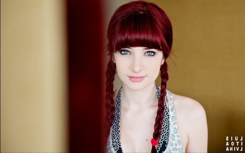 face, halter, jewelry, gray, redhead, fashion, bangs, lifestyles, model, real people, beauty, beautiful woman, headshot, dyed red hair, young adult, s