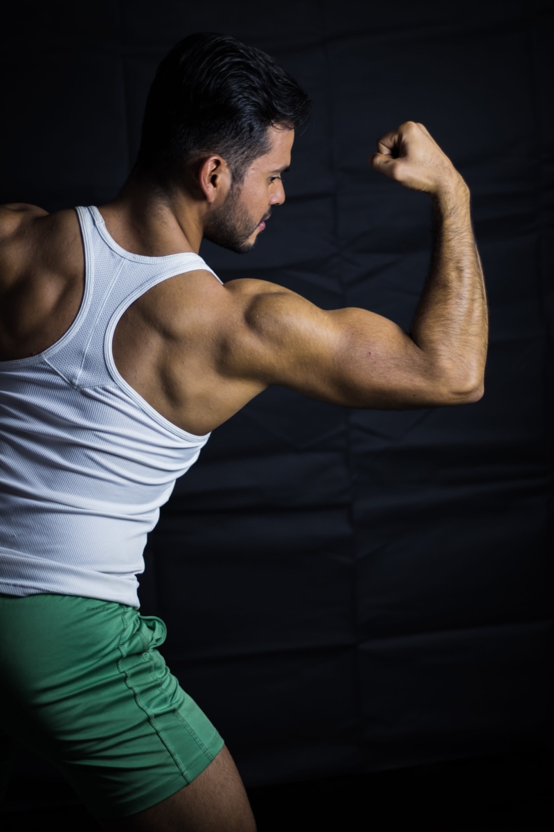 one person, human muscle, men, sport, biceps, young adult, determination, body, indoors, muscular build, bicep, young men, athlete, young, clothing, healthy lifestyle