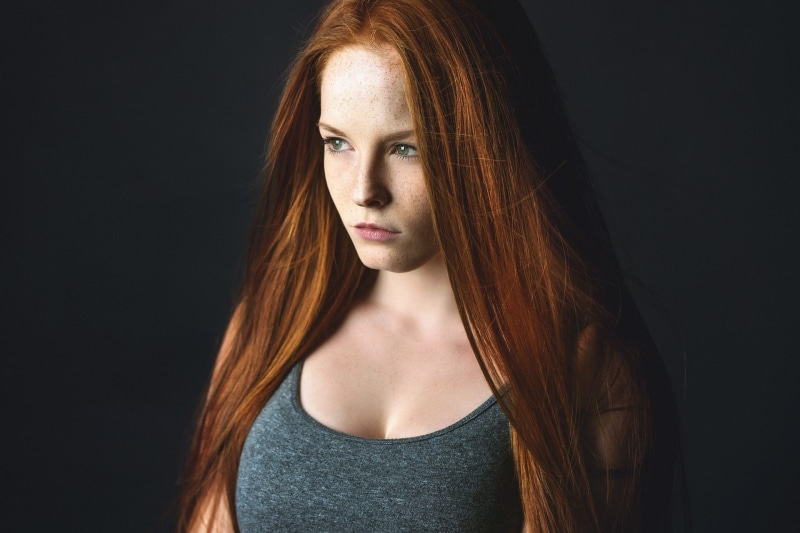 looking away, freckles, redhead, long hair, portrait, women, grey tops, 1080P, Martin Kühn, blue eyes