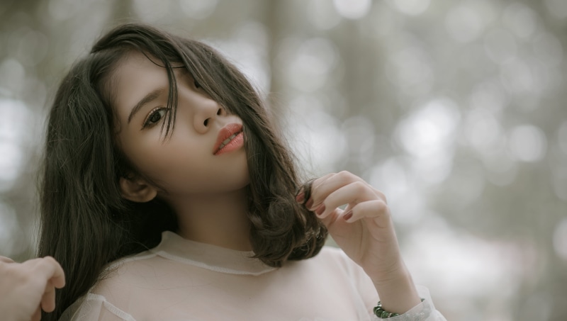 skin, woman, teenager, hair, hands, young, women, person, long, adult, eye, focus on foreground, lips, haired, girl, outdoors, selfie, black, pose, black hair
