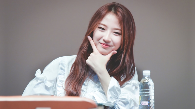 one person, long hair, brown hair, container, indoors, hairstyle, young adult, hair, sitting, glass, K-pop, headshot, bottle, 2K, beautiful woman, front view