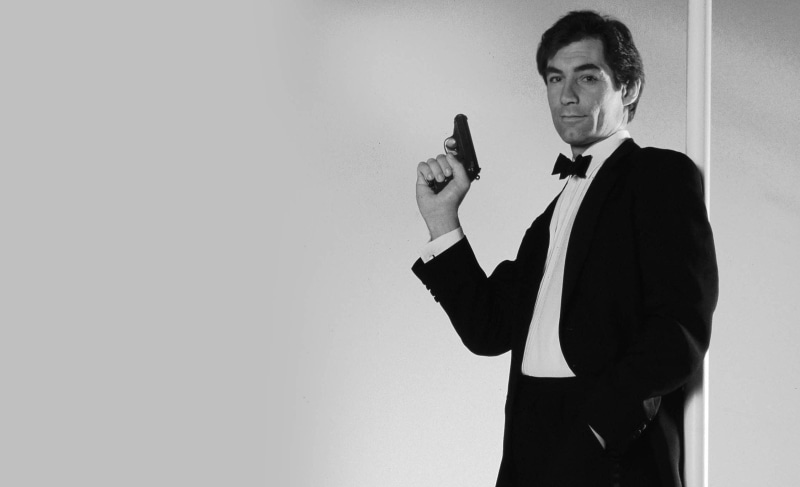 1080P, timothy dalton, young adult, tuxedo, James Bond, suit, alcohol, men, adult, copy space, studio shot, standing, bow tie, jacket, holding, clothing