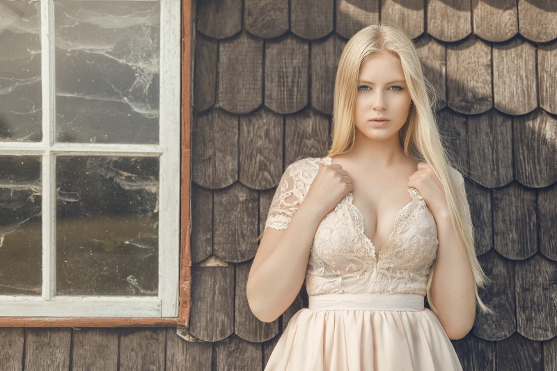 blue eyes, blonde, women, portrait, long hair, 500px, wooden surface, house, women outdoors, looking at viewer, model, 1080P, window, cleavage, face, Tonny