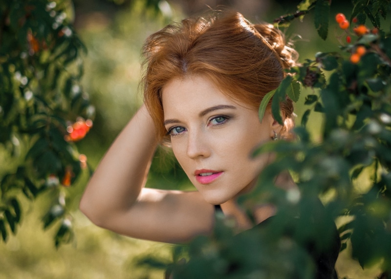 hair, 1080P, looking at viewer, depth of field, outdoors, young adult, women, hands in hair, tree, face, body part, young women, beauty, women outdoors