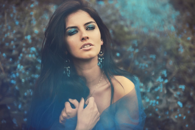 face, looking at camera, young adult, fashion, real people, long hair, hairstyle, front view, beauty, outdoors, headshot, Aurela Skandaj, one person, beautiful woman