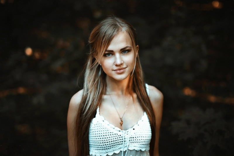 blond hair, beauty, Alla Emelyanova, straight hair, young women, focus on foreground, s, hair, necklace, beautiful woman, looking at viewer, black background