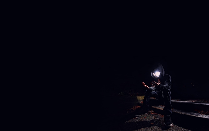 seat, young adult, pants, real people, one person, lifestyles, nature, night, illuminated, men, Void, s, young men, unrecognizable person, casual clothing