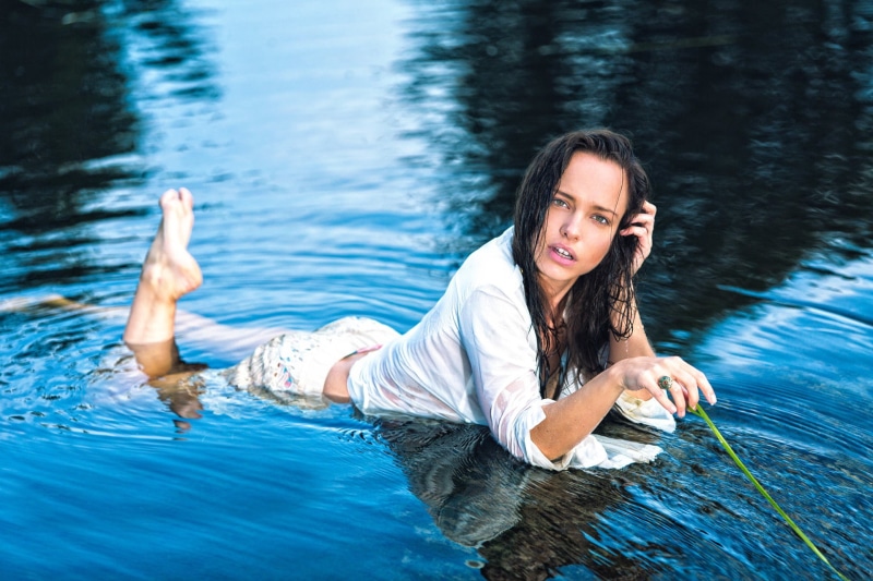 lying on front, in water, hands in hair, feet in the air, wet clothing, black hair, 1080P, women