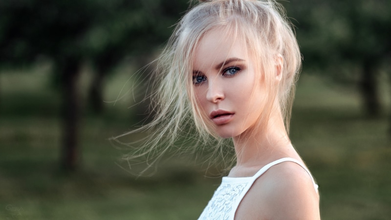 looking at viewer, portrait, eyes, women outdoors, Georgy Chernyadyev, depth of field, Victoria Pichkurova, 1080P, platinum blonde, women, model, windy