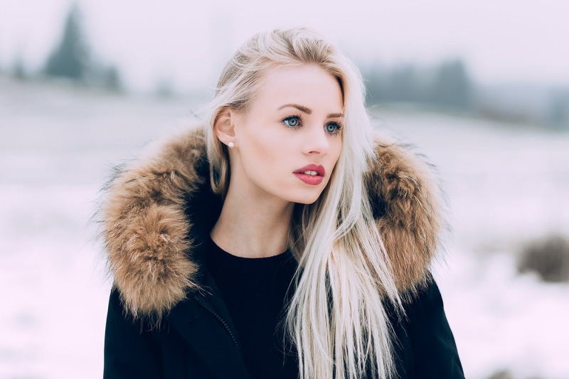 blonde, juicy lips, jacket, clothing, young women, hairstyle, young adult, focus on foreground, warm clothing, winter, pale, open mouth, pearl earrings