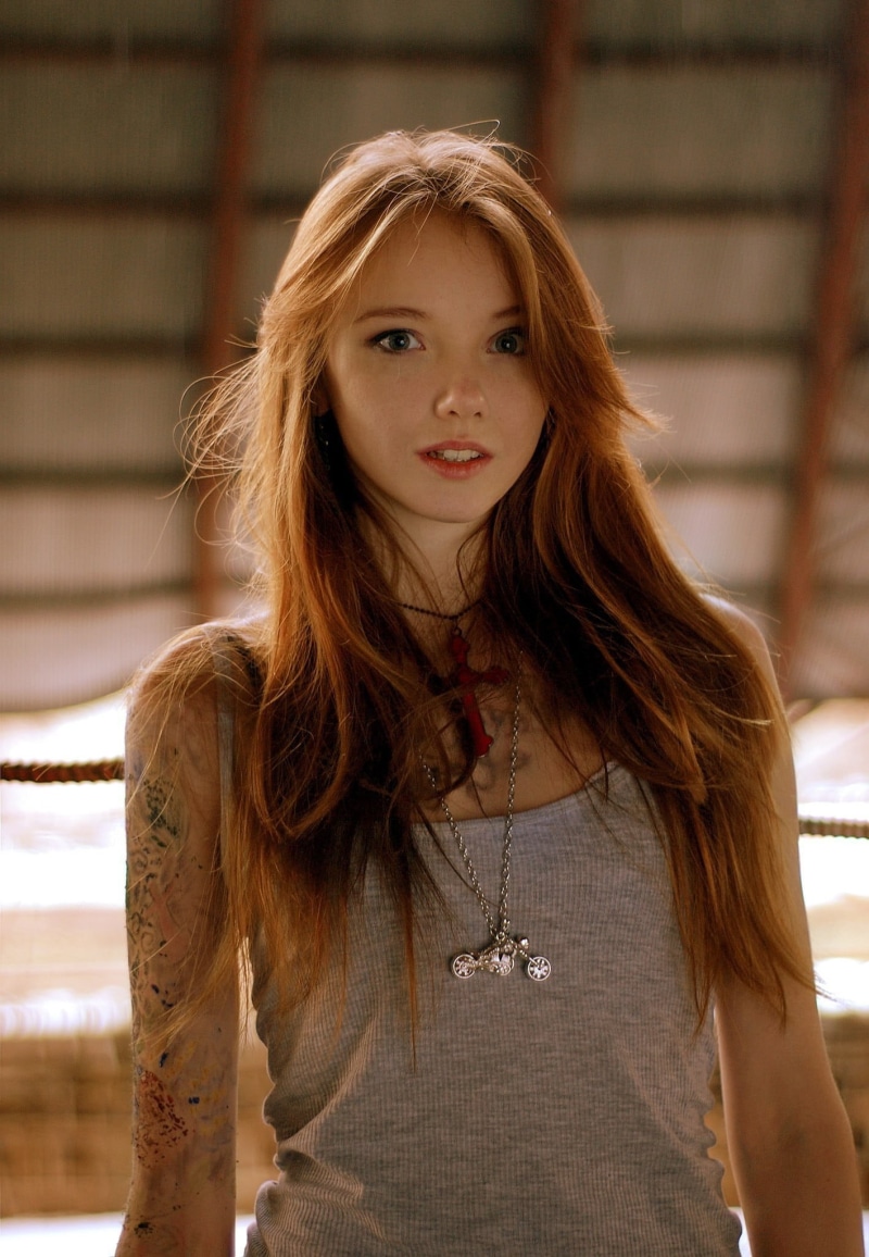 casual clothing, Olesya Kharitonova, hairstyle, beautiful woman, standing, teenager, tattoo, s, hair, adult, tank, focus on foreground, wavy hair, young adult