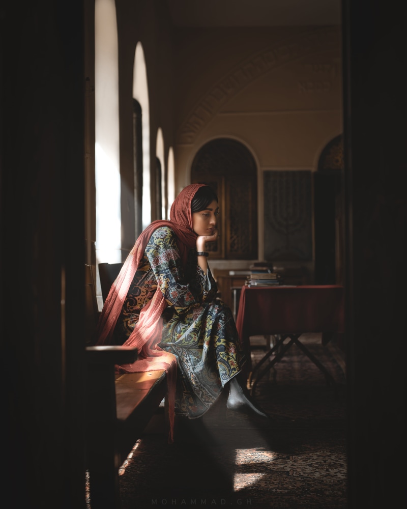 hairstyle, headscarf, thinking, full length, woman, portrait, young women, arch, seat, 5K, senseoriented, side, waiting, clothing, young adult, mid adult