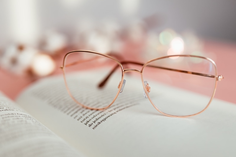 open, background, feminine, eyesight, pink, glass - material, learning, pink backgound, personal accessory, reading glasses, transparent, focus on foreground