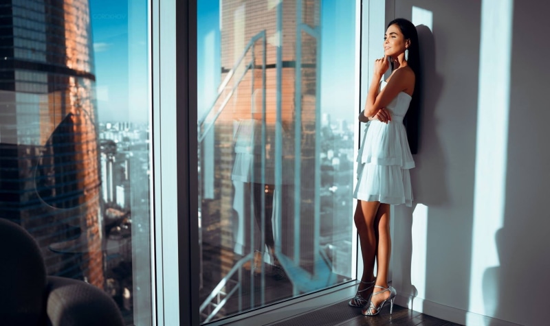 white dress, outdoors, hairstyle, reflection, looking, standing, 1080P, contemplation, architecture, adult, glass - material, one person, beautiful woman
