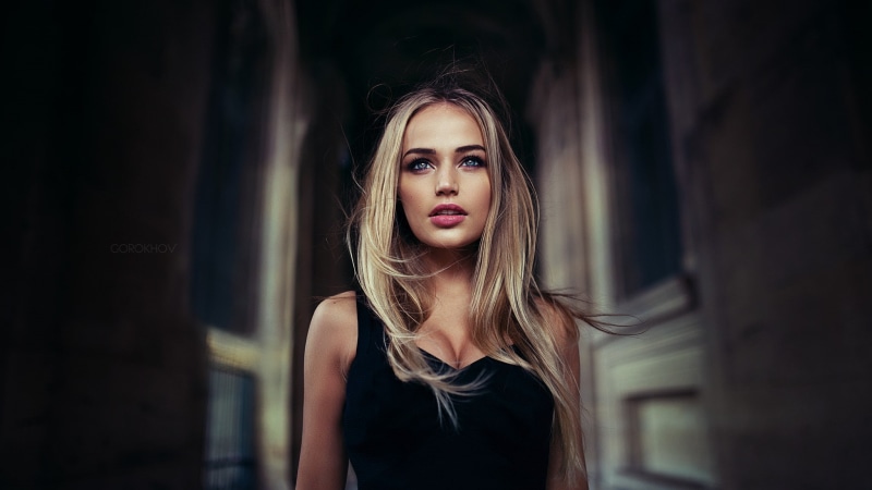 blue eyes, 1080P, model, juicy lips, cleavage, blonde, Russian Model, hallway, Maria Puchnina, open mouth, black dress, Mary Jane, portrait, bare shoulders