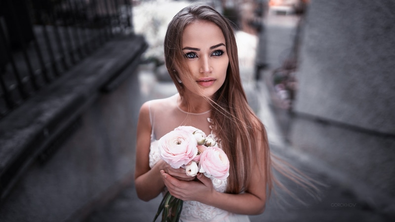 brunette, Maria Puchnina, portrait, women, flowering plant, Mary Jane, face, dress, hairstyle, smirk, beautiful woman, depth of field, sweet food, wedding dress