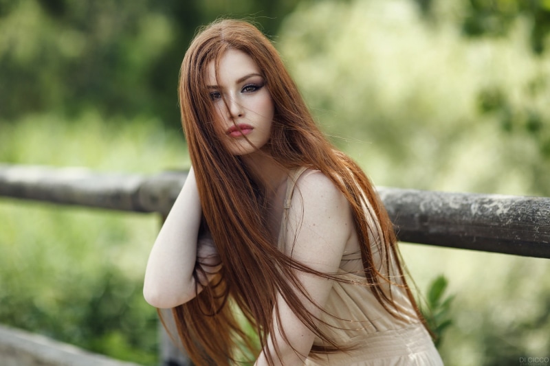 1080P, women outdoors, long hair, face, looking at camera, portrait, juicy lips, teenager, pale, hairstyle, one person, contemplation, focus on foreground