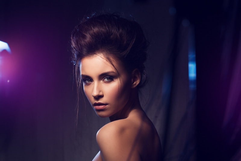 young adult, brown hair, human hair, eyeliner, beautiful woman, headshot, lights, 1080P, adult, portrait, looking at viewer, dark, human face, smoky eyes