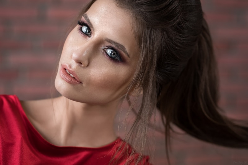 brown hair, human body part, young adult, face, long hair, beautiful woman, brunette, smoky eyes, front view, portrait, brick, beauty, contemplation, beautiful people